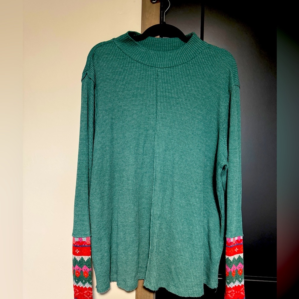 Forest green thermal shirt with colorful sleeve detail, Maurice’s, size is XXL
